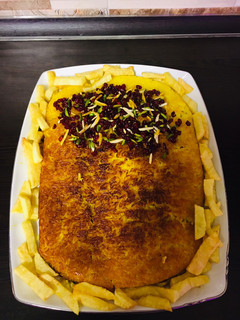 عکسی از دستور ته چين مرغ(بدون تخم مرغ)