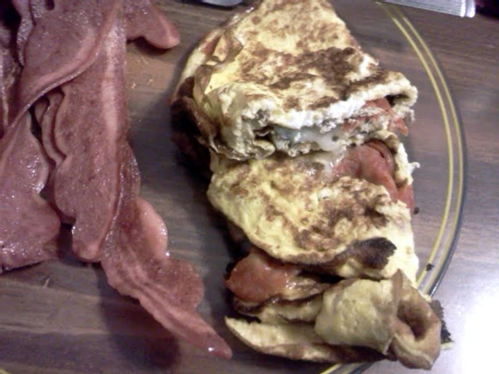 Easy Steps to Make pepperoni and cheese omlet the So Delicious Delicious