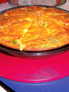 A picture of crustless vegtable & ham quiche.