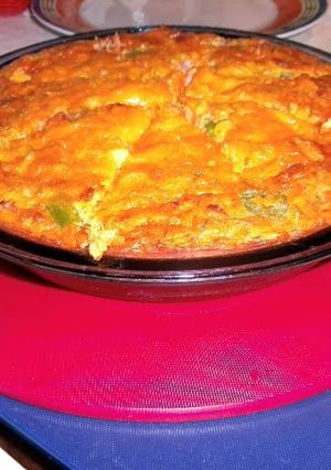 A picture of crustless vegtable & ham quiche.