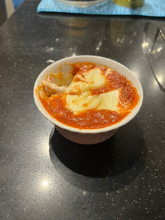 Una foto de Pizza en taza
