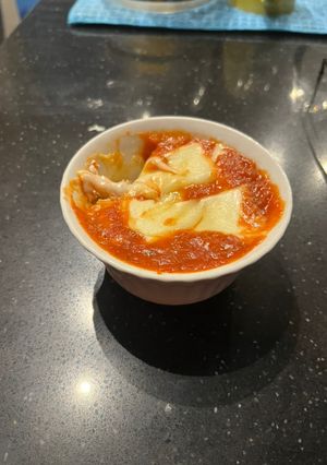 Una foto de Pizza en taza
