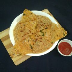 A picture of Cheesy onion Paratha.