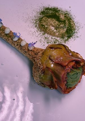 A picture of Artichoke with hazelnut flour, garlic purée and artichoke mayonnaise 💚.