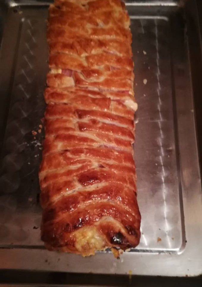 Una foto de Trenza de hojaldre relleno salado
