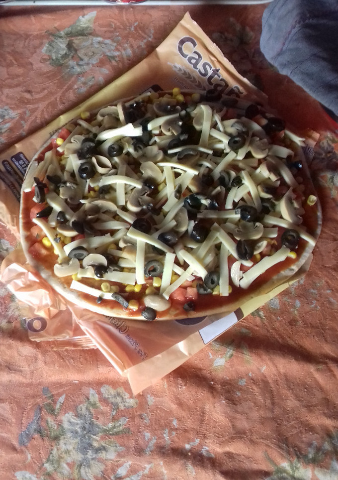 Una foto de Pizza vegetariana