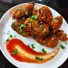 A picture of Stuffed Palak Onion pakoda.