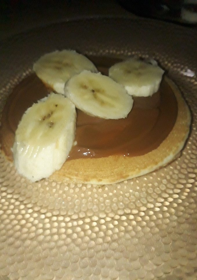 Una foto de Hot cakes con banana y dulce de leche🍌🥞