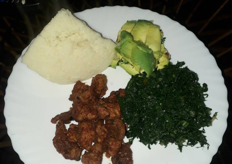 Fried Pork, greens and ugali