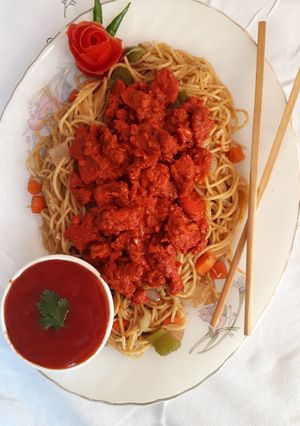 A picture of Tandoori Chicken and Vegetables Spaghetti.