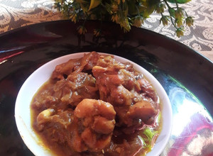 A picture of Bengali chicken curry.