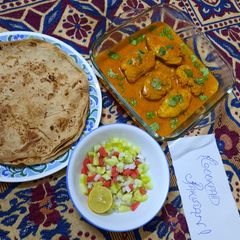 A picture of Yummy and tasty tikka masala fish with yogurt.