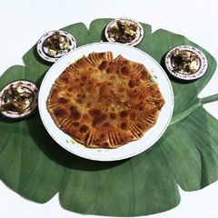 A picture of Cheeni ka paratha.