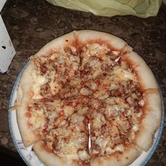 A picture of Malai boti pizza.