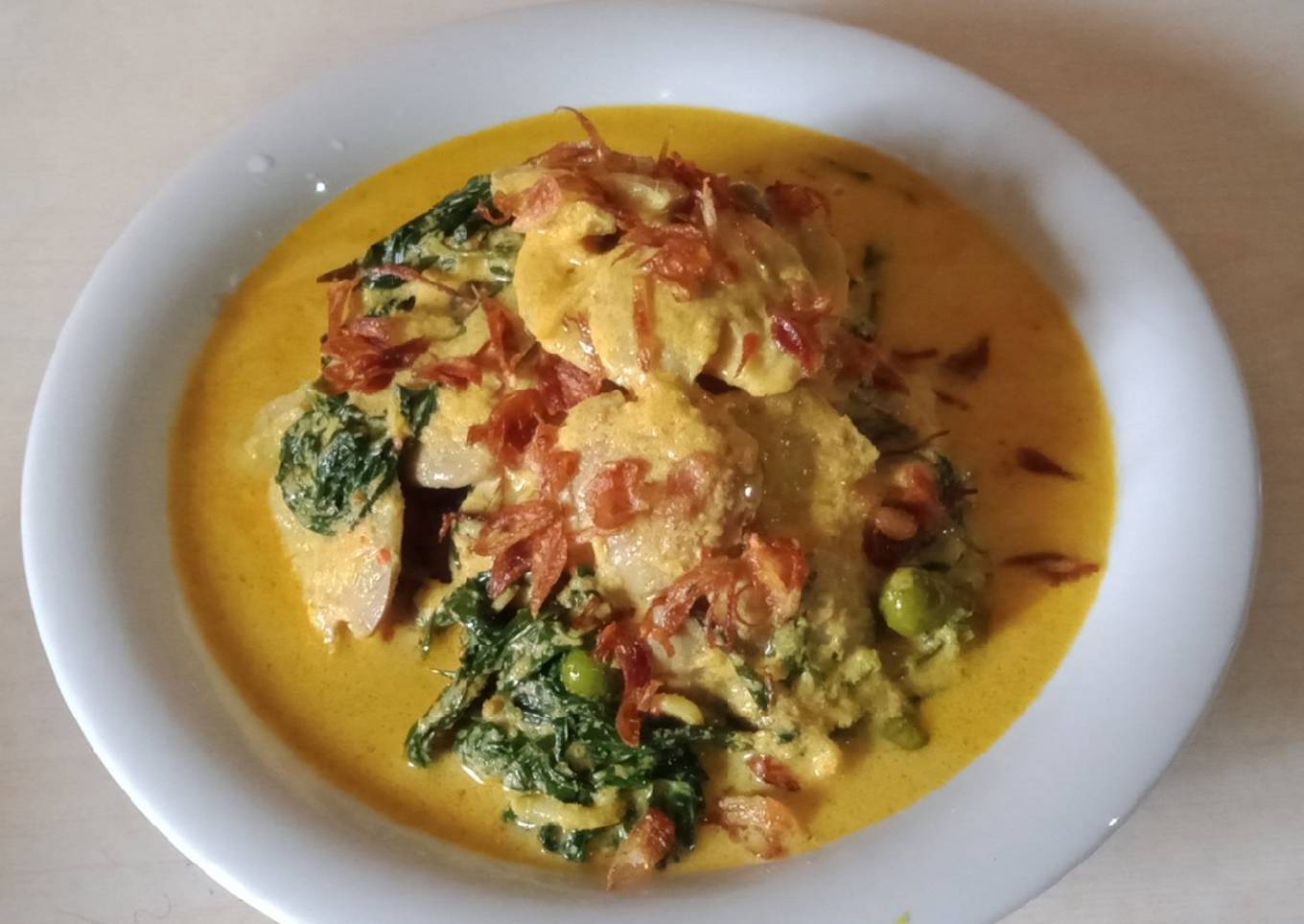 Gulai jengkol pucuk ubi