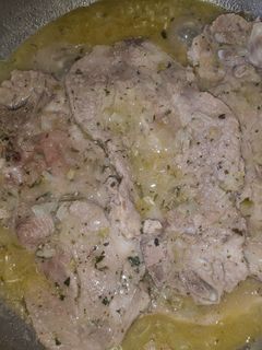 Una foto de 61. Chuletas de aguja en salsa