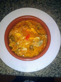 Una foto de Pescadilla con arroz y almejas