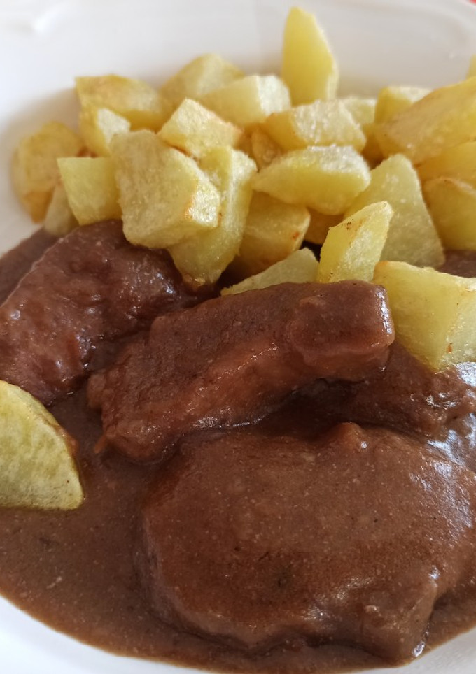 Una foto de Puntas de solomillo de cerdo al vino tinto