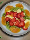 Macedonia con fresa y naranja