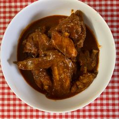 A picture of Malvani Chicken Curry.