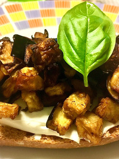 A picture of Bruschetta with Greek Yogurt and Eggplant.