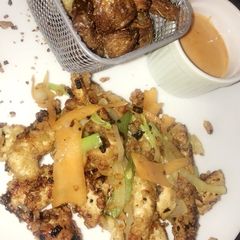 A picture of Turkey Chilli strips and roasted potatoes.