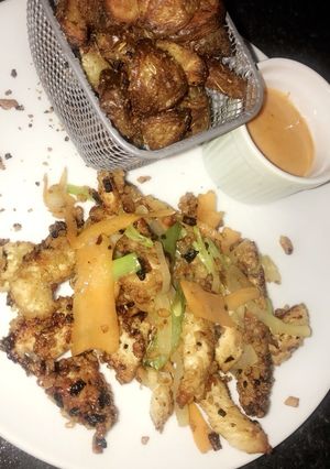 A picture of Turkey Chilli strips and roasted potatoes.