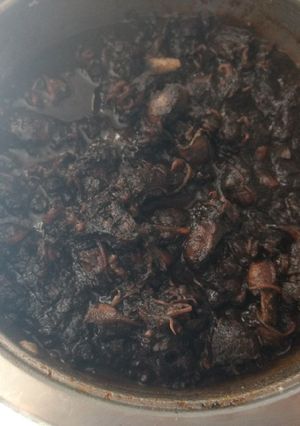 Una foto de Chipirones en su tinta