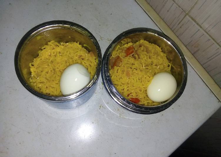 Indomie and veggies with boiled egg