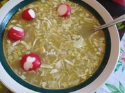 Una foto de pozole verde