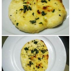 A picture of Mini garlic butter tawa naan😋💛.