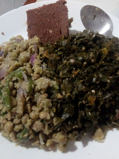 A picture of Mole A La Grace Greens With Simple Stir-Fried Green Pigeon Peas.
