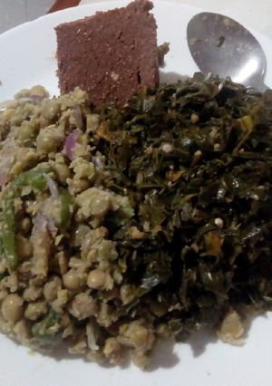 A picture of Mole A La Grace Greens With Simple Stir-Fried Green Pigeon Peas.