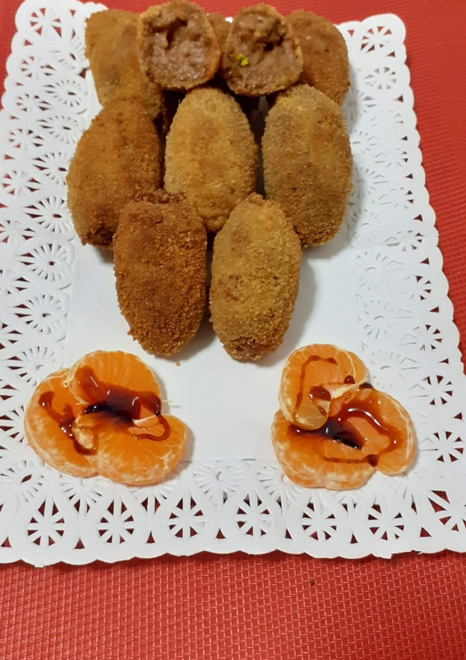 Una foto de Croquetas de chocolate y pistachos