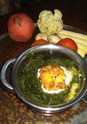 A picture of Palak malai kofta.
