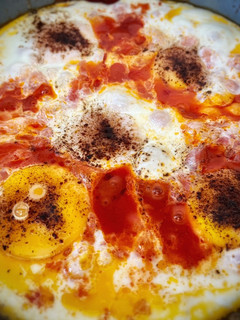 Una foto de Huevos pisciteddru (Huevos a la italiana o huevos en purgatorio)