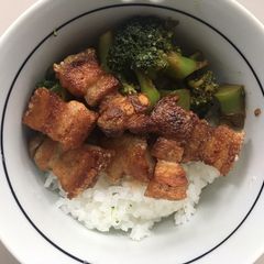 A picture of Crispy Pork Rashers with Sticky jasmine rice.