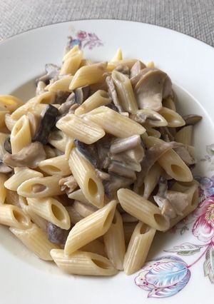 A picture of Wild mushrooms and cream pasta.