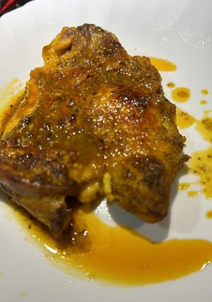Una foto de Pollo con vino blanco al horno