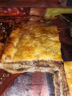 Una foto de Empanada de morcilla y manzana