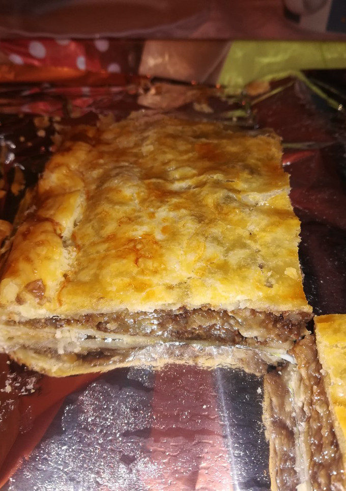 Una foto de Empanada de morcilla y manzana
