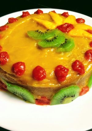 A picture of Mango Cake With Mango Glaze.