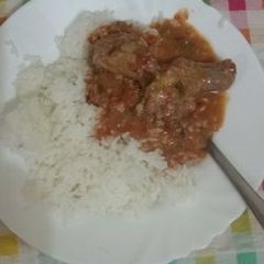 A picture of Coconut rice and peanut chicken.