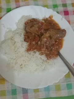 A picture of Coconut rice and peanut chicken.