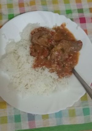 A picture of Coconut rice and peanut chicken.