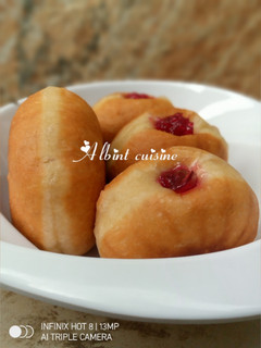 A picture of Jam filled doughnuts.