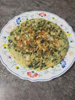 Una foto de Tortilla De Espinacas con Queso Rallado