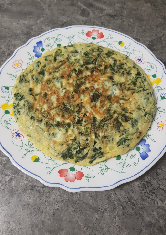 Una foto de Tortilla De Espinacas con Queso Rallado