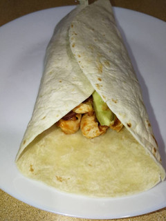 Una foto de Fajitas de pollo con tomate frito