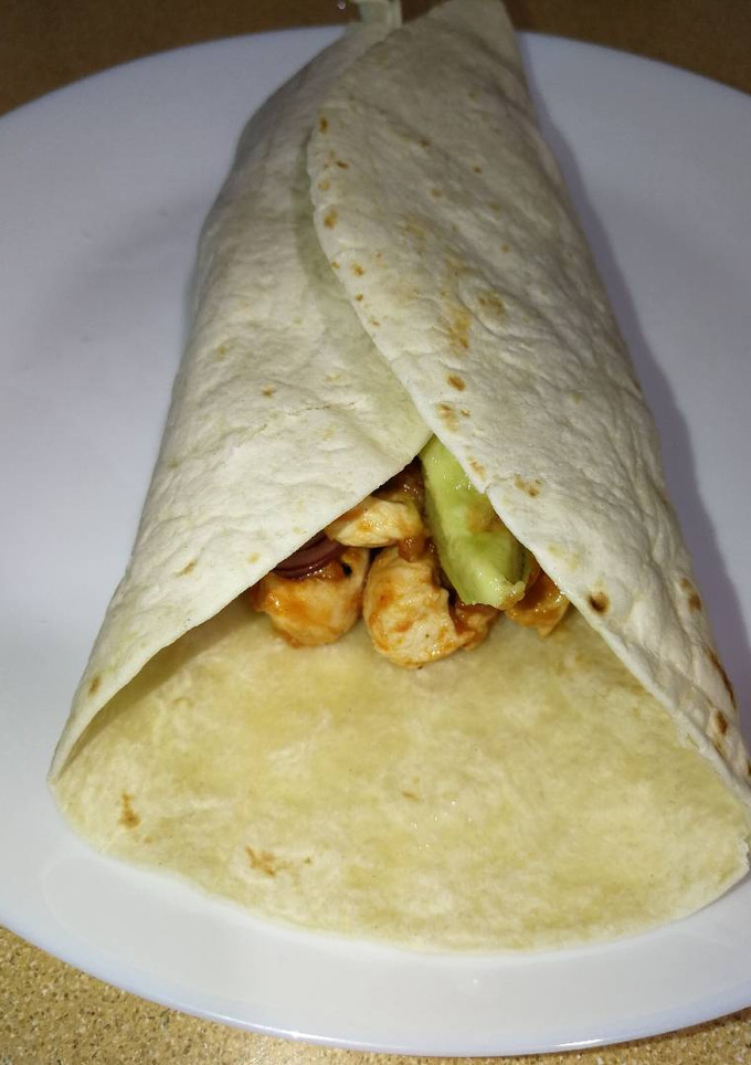 Una foto de Fajitas de pollo con tomate frito